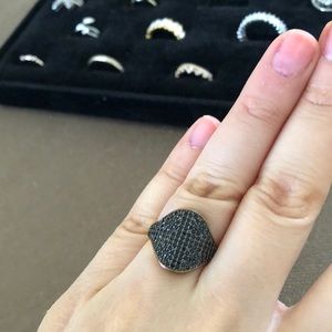 Black diamond and gold ring